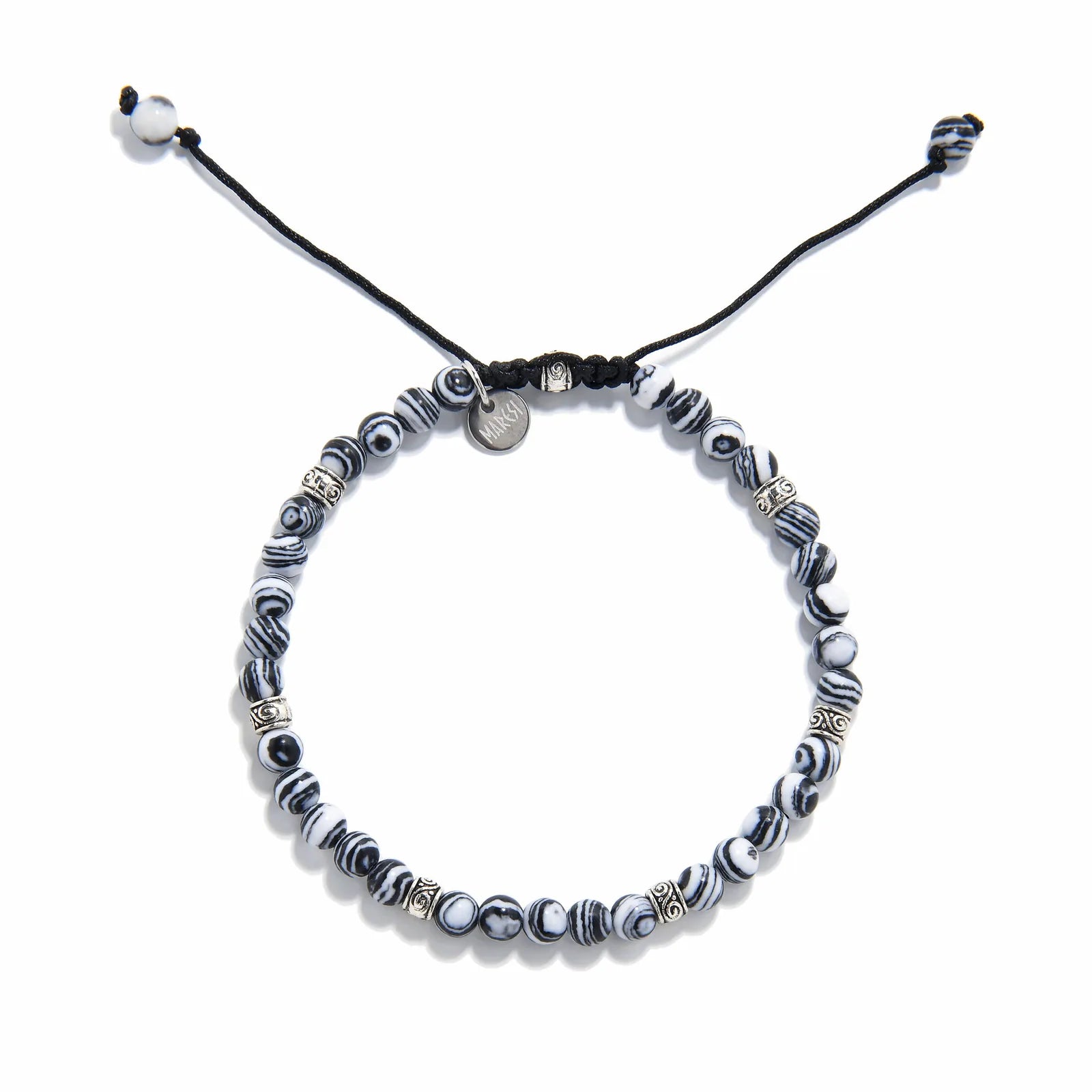 men’s malachite bracelet laid flat, showing circular pattern and woven cord clasp