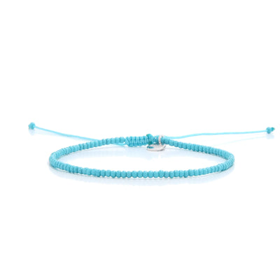 Mens Beaded Bracelets shown in full view with turquoise seed beads with silver charm and adjustable cord