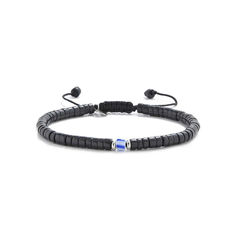 Mens Black Pearl Bracelet shown in full view with matte black clay beads with blue accent bead and adjustable cord