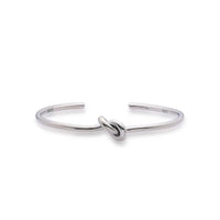 Mens Cuff Bracelets with polished open band, center knot detail, and stamped inner ends