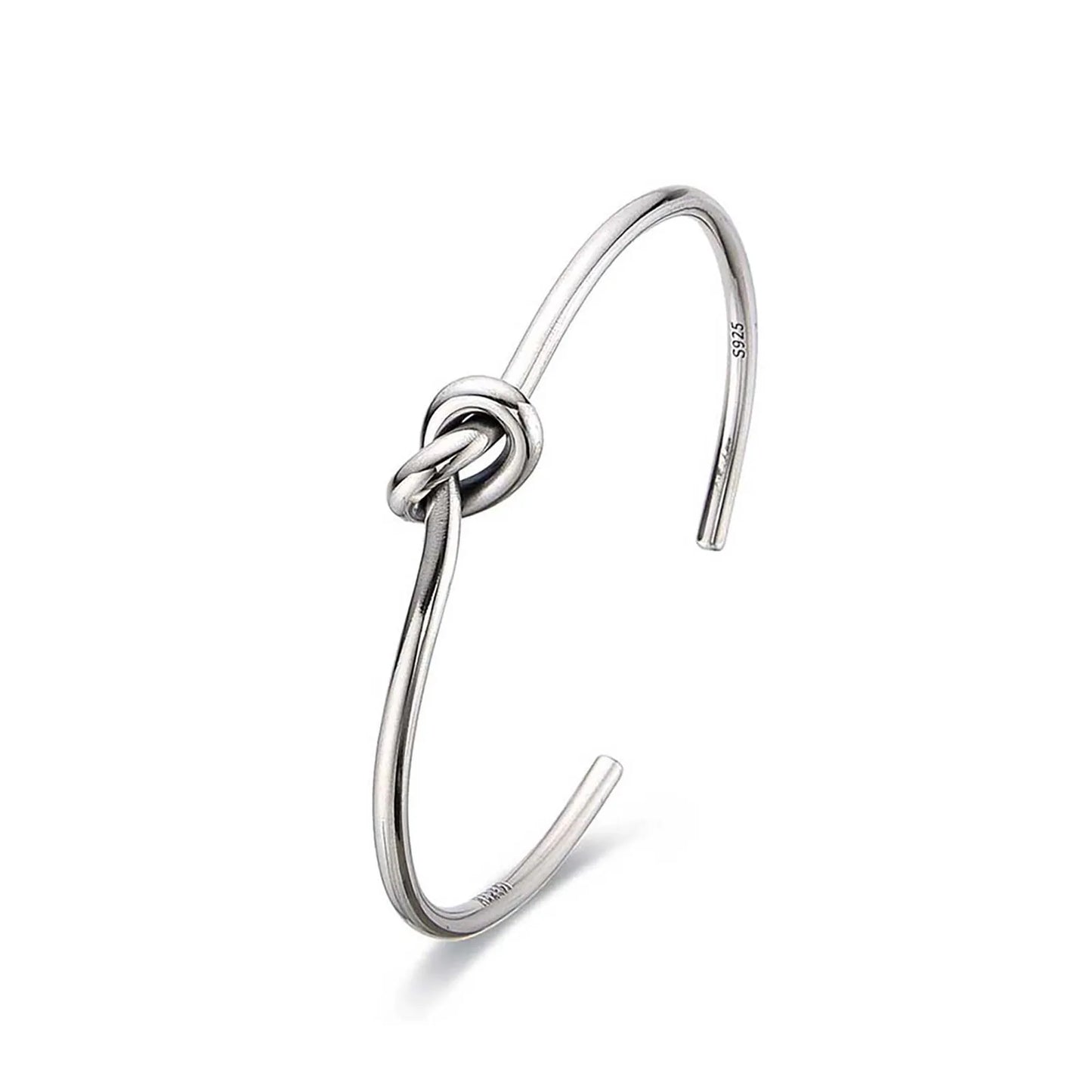 Mens Cuff Bracelets shown in side profile with open cuff shape and raised knot centerpiece