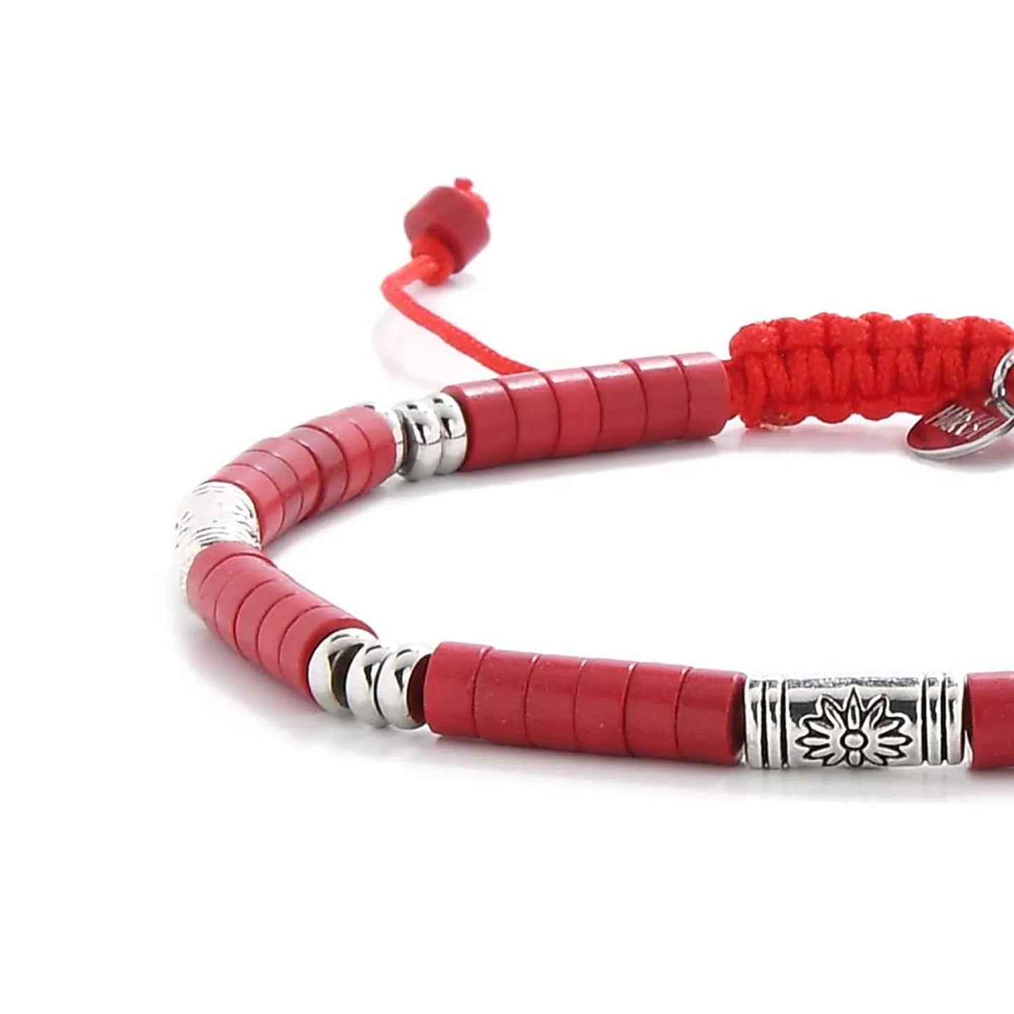 Close-up of mens red bracelet showing red clay beads with engraved silver spacers, silver charm, and cord closure