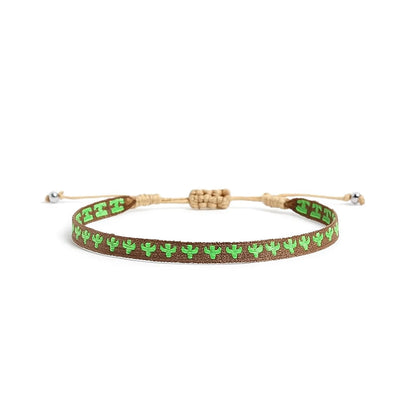 Mens rope bracelet in brown with green cactus pattern, adjustable cord, and silver bead ends