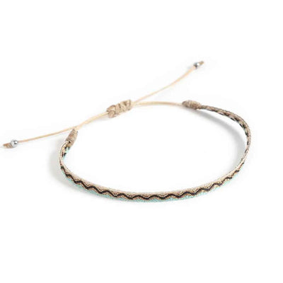 Men's Rope Bracelets shown from above with cream woven band and sliding knot cord closure