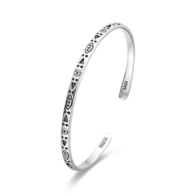 Mens Stainless Steel Bracelets shown in angled profile with geometric symbols and open cuff ends