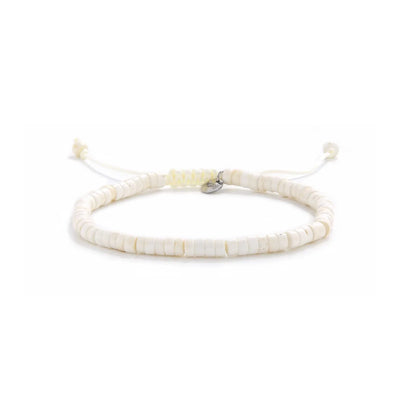 Off White Bracelet shown in full view with off white clay beads with blue accent bead and adjustable cord