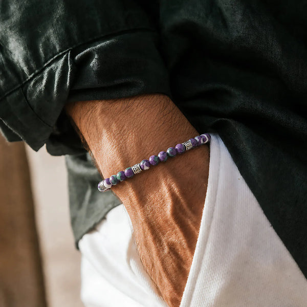 Purple Jasper Bracelet worn on a wrist with a dark sleeve