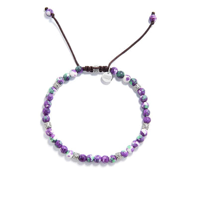 purple gemstone bracelet featuring vivid colors and adjustable brown cord

