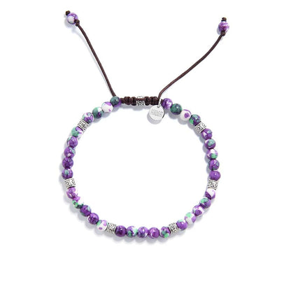 purple gemstone bracelet featuring vivid colors and adjustable brown cord

