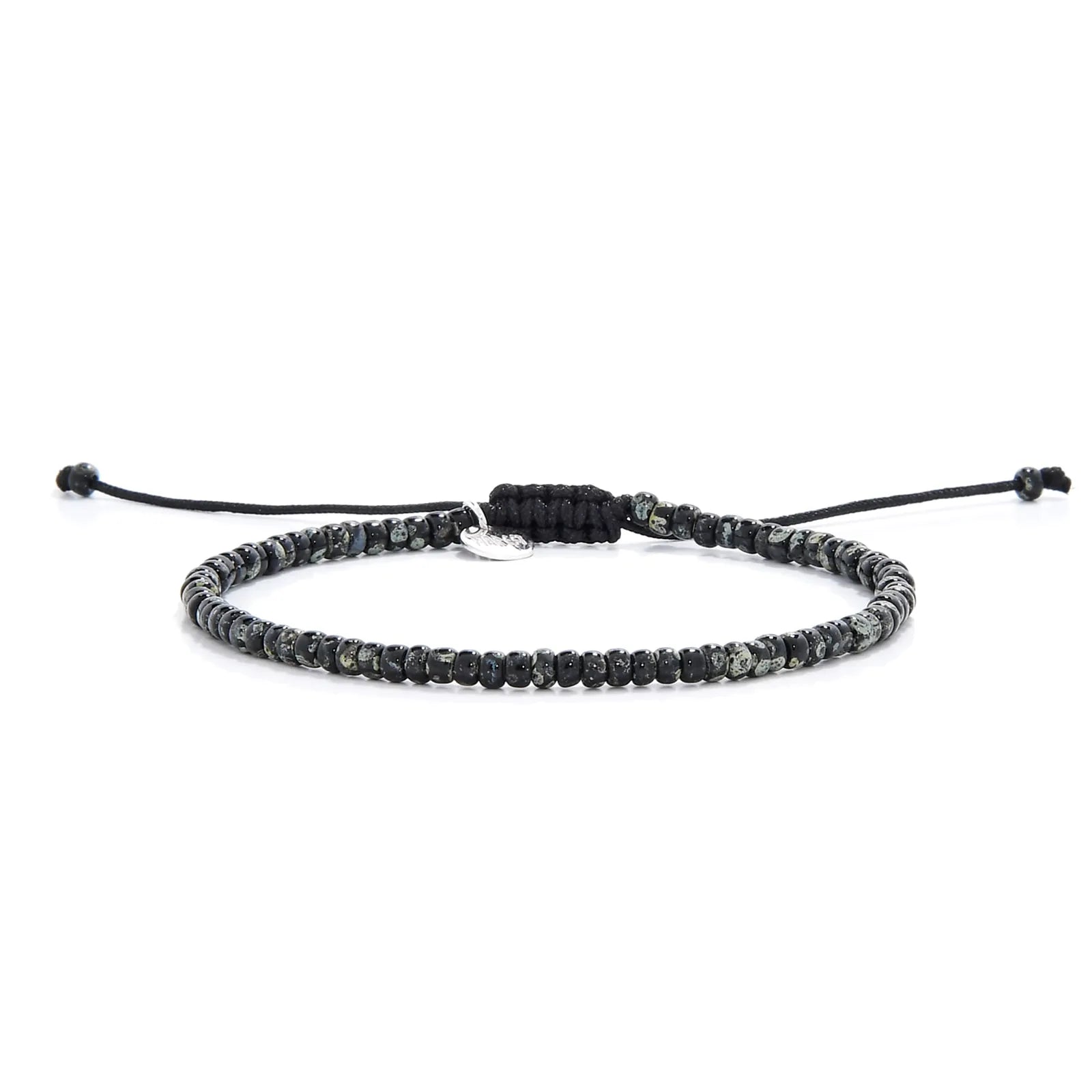Seed Bead Bracelets shown in full view with black and gray Picasso seed beads and adjustable cord
