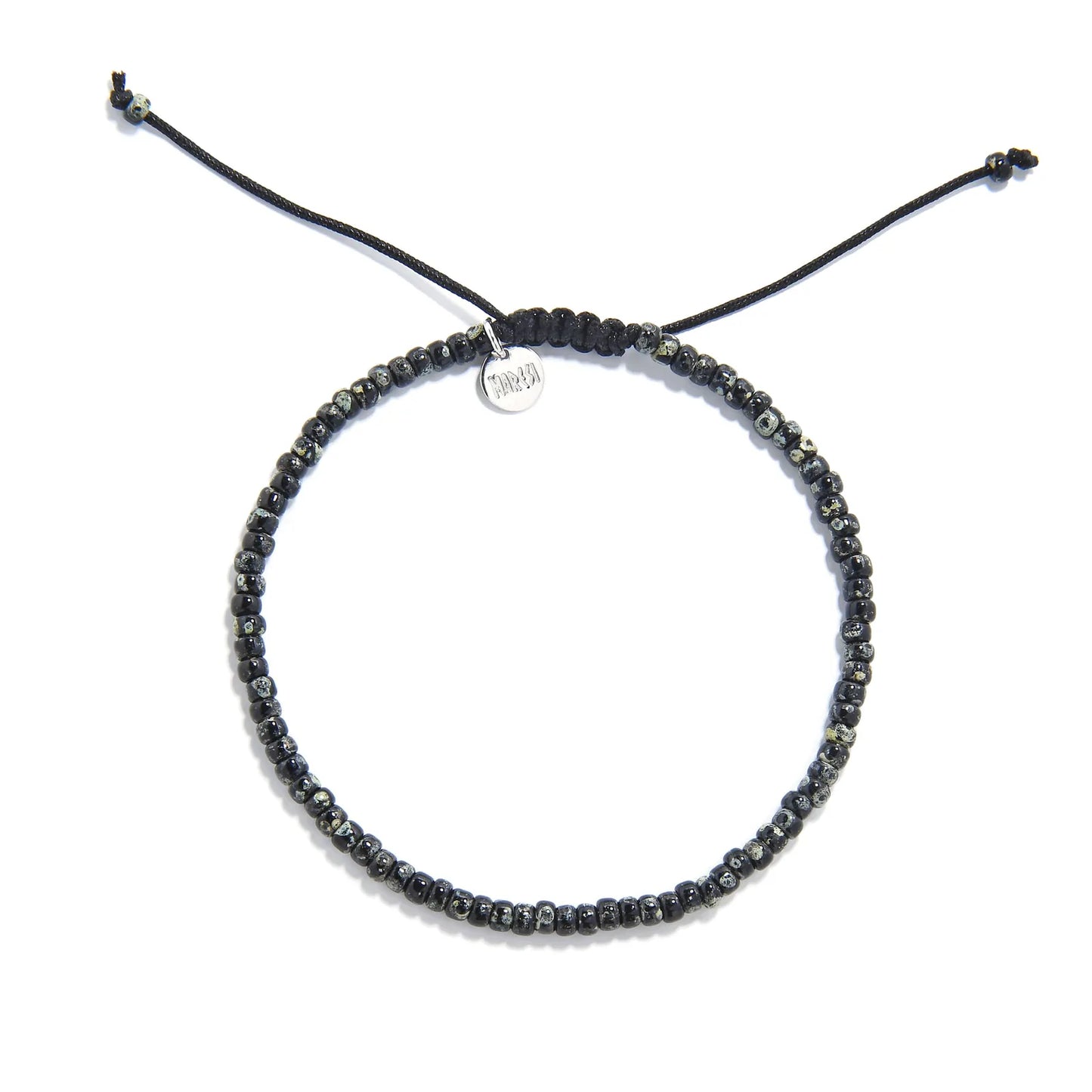 Seed Bead Bracelets shown from above with black and gray Picasso seed beads and round bracelet shape