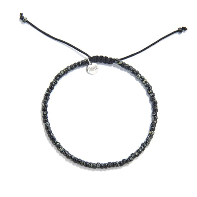 Seed Bead Bracelets shown from above with black and gray Picasso seed beads and round bracelet shape