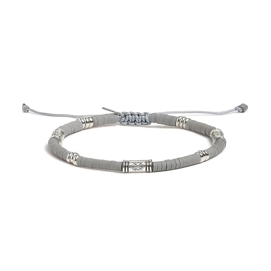 Shamballa Bracelet shown in full view with gray clay beads with engraved silver spacers and adjustable cord