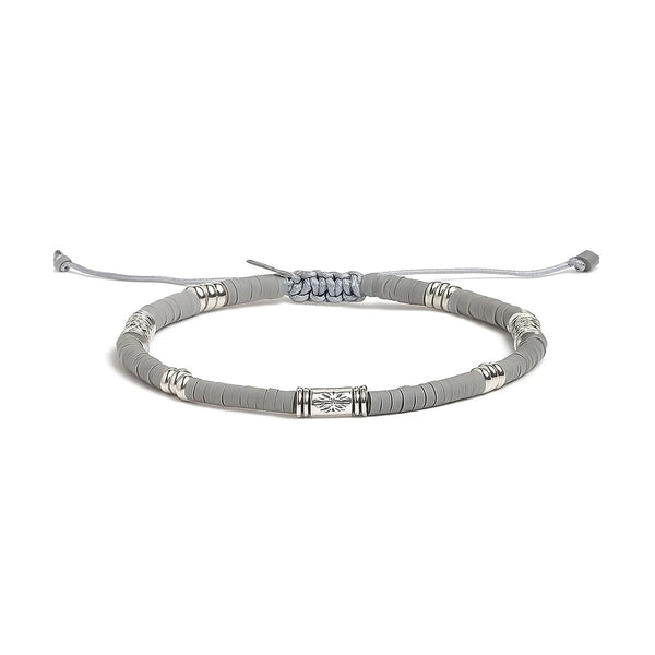 Shamballa Bracelet shown in full view with gray clay beads with engraved silver spacers and adjustable cord