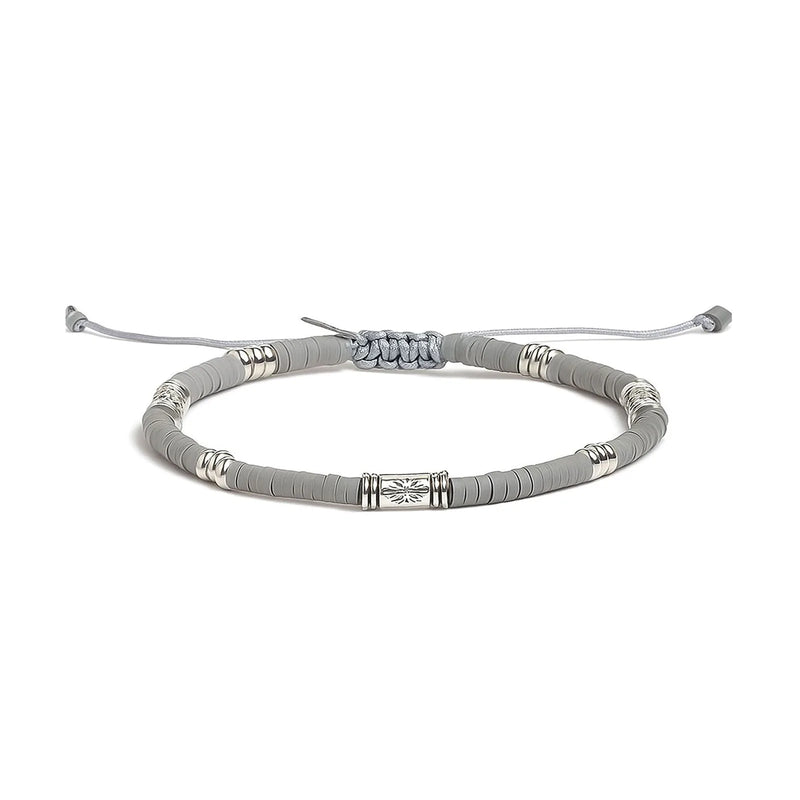 Shamballa Bracelet shown in full view with gray clay beads with engraved silver spacers and adjustable cord