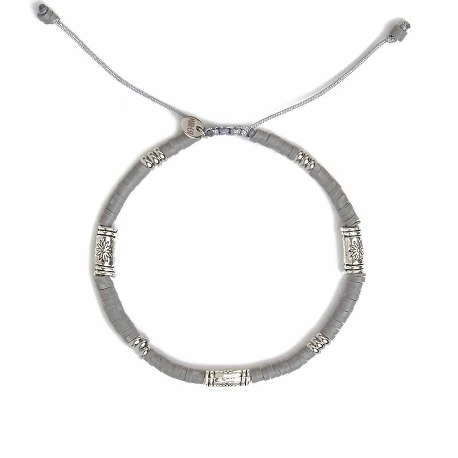 Shamballa Bracelet shown from above with gray clay beads with engraved silver spacers and round bracelet shape