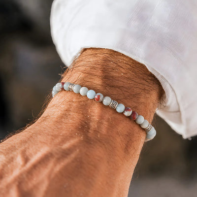 Shoushan Stone worn on a wrist with beaded design and adjustable cord