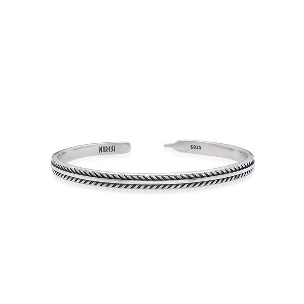 Silver Mens Bracelet cuff with feather-style engraving, polished open band, and stamped ends