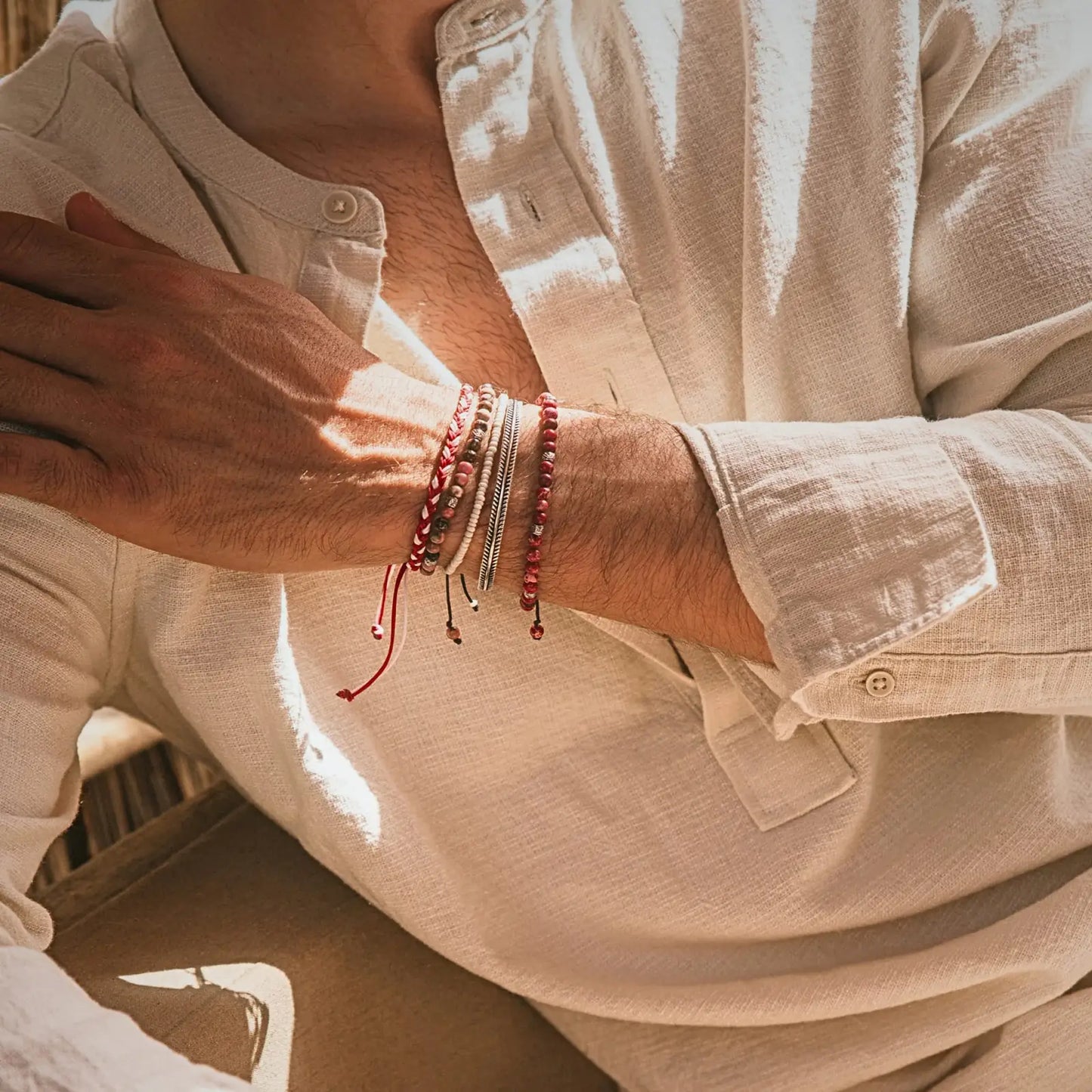 Stack Bracelet bracelet close-up showing polished stone patterns and metal details