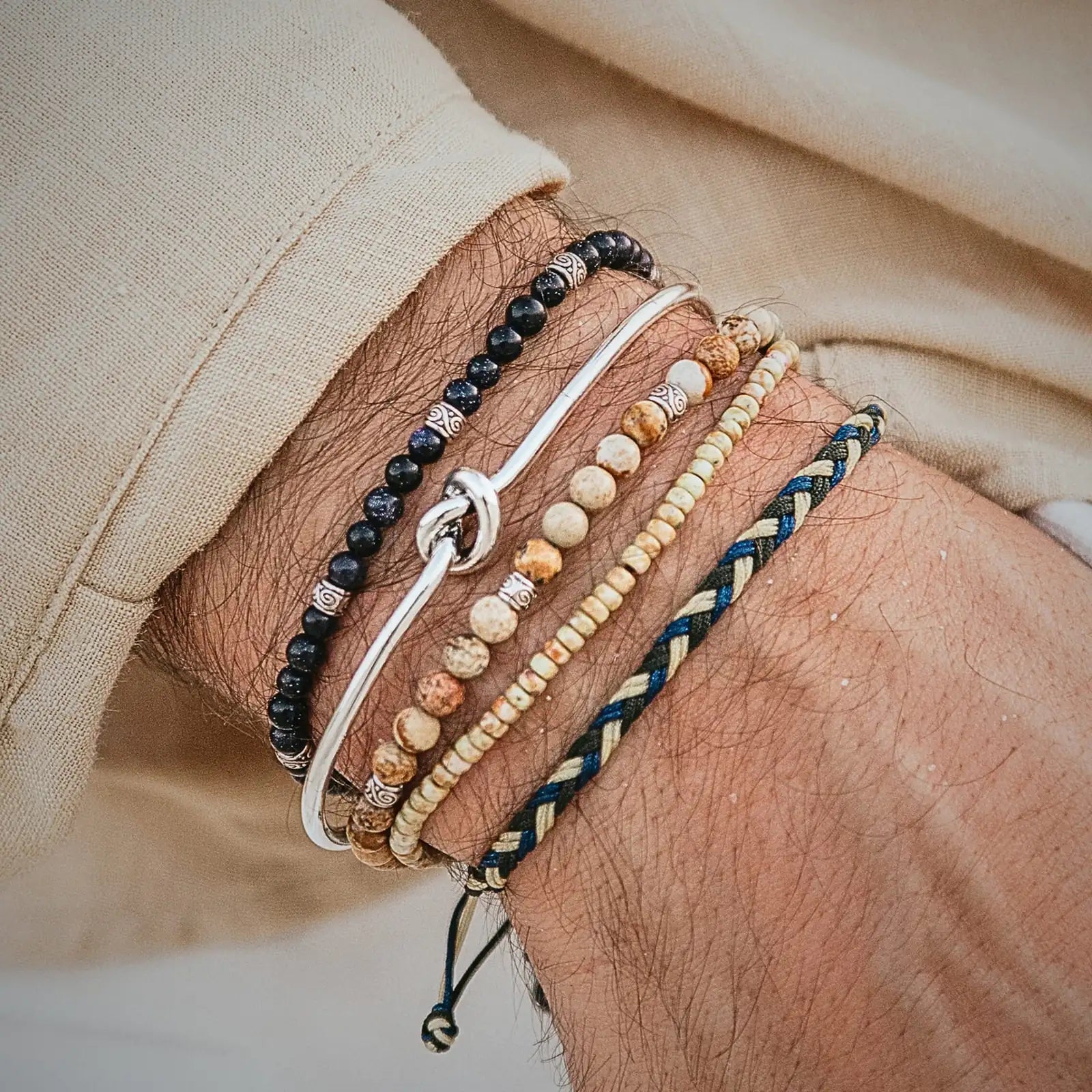 Stacked Bracelets bracelet product image with polished beads and metal accents