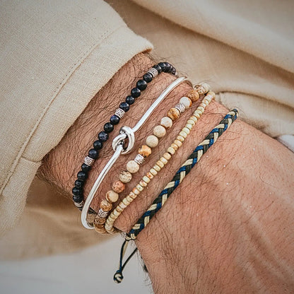 Stacked Bracelets bracelet product image with polished beads and metal accents