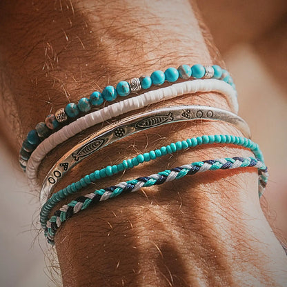 Stacking Bracelets bracelet close-up showing polished stone patterns and metal details
