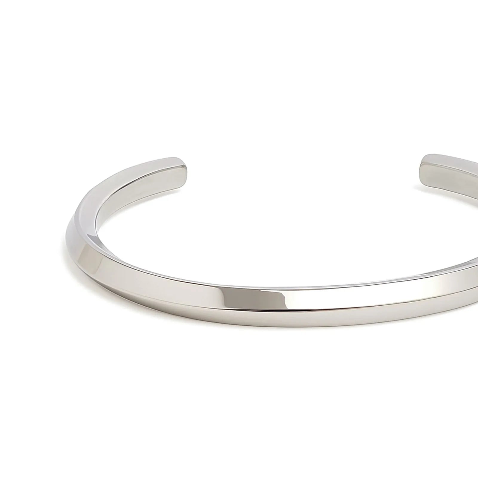 Close-up of stainless steel bracelet for men showing smooth polished band and rounded open ends