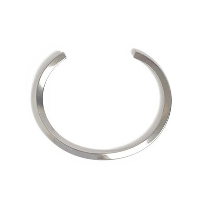 Stainless steel bracelet for men shown from above with curved open cuff shape and polished finish
