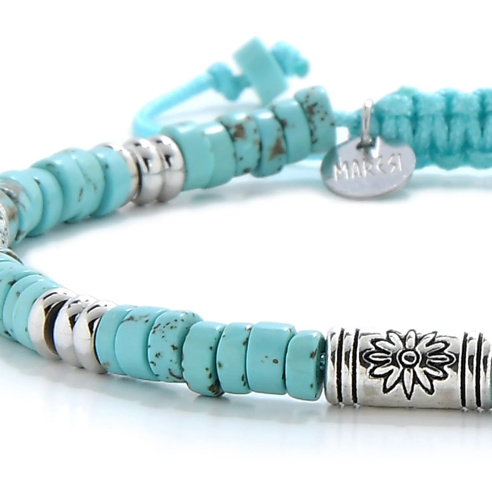 Detailed view of Turquoise Jewelry for Sale with turquoise clay beads with engraved silver spacers, Shamballa clay bead