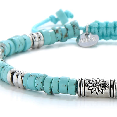 Detailed view of Turquoise Jewelry for Sale with turquoise clay beads with engraved silver spacers, Shamballa clay bead