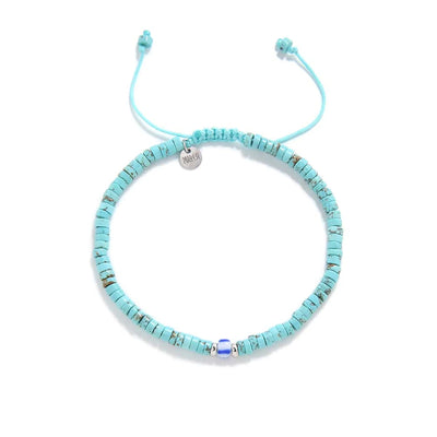 turquoise men's bracelets shown from above with turquoise clay beads with blue accent bead and round bracelet shape
