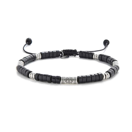 Full circular layout of mens black bead bracelet with silver-tone details