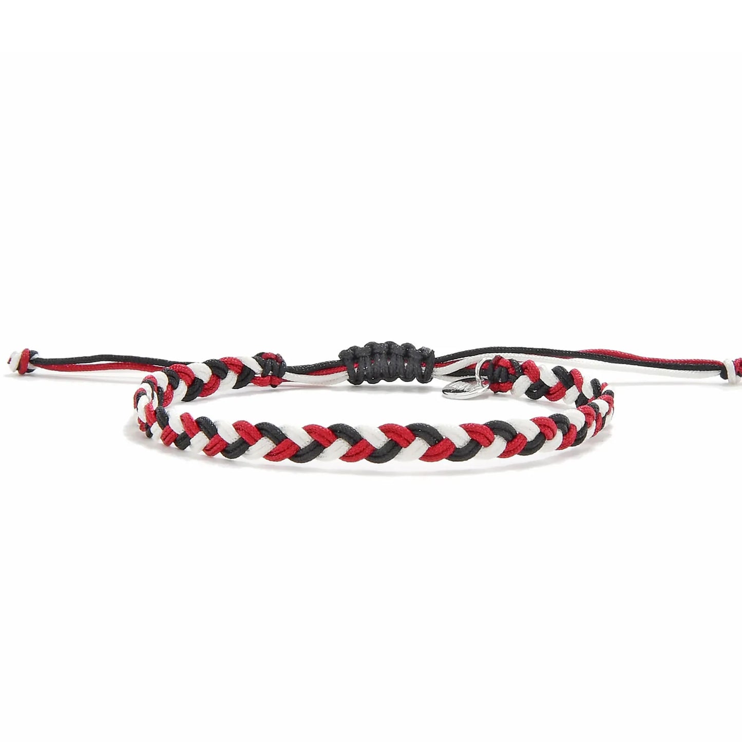 Friendship Bracelet Arts shown stacked on wrist with coordinating beaded bracelets and metal accents