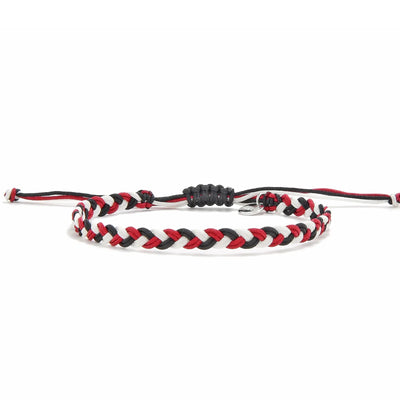 Friendship Bracelet Arts shown stacked on wrist with coordinating beaded bracelets and metal accents