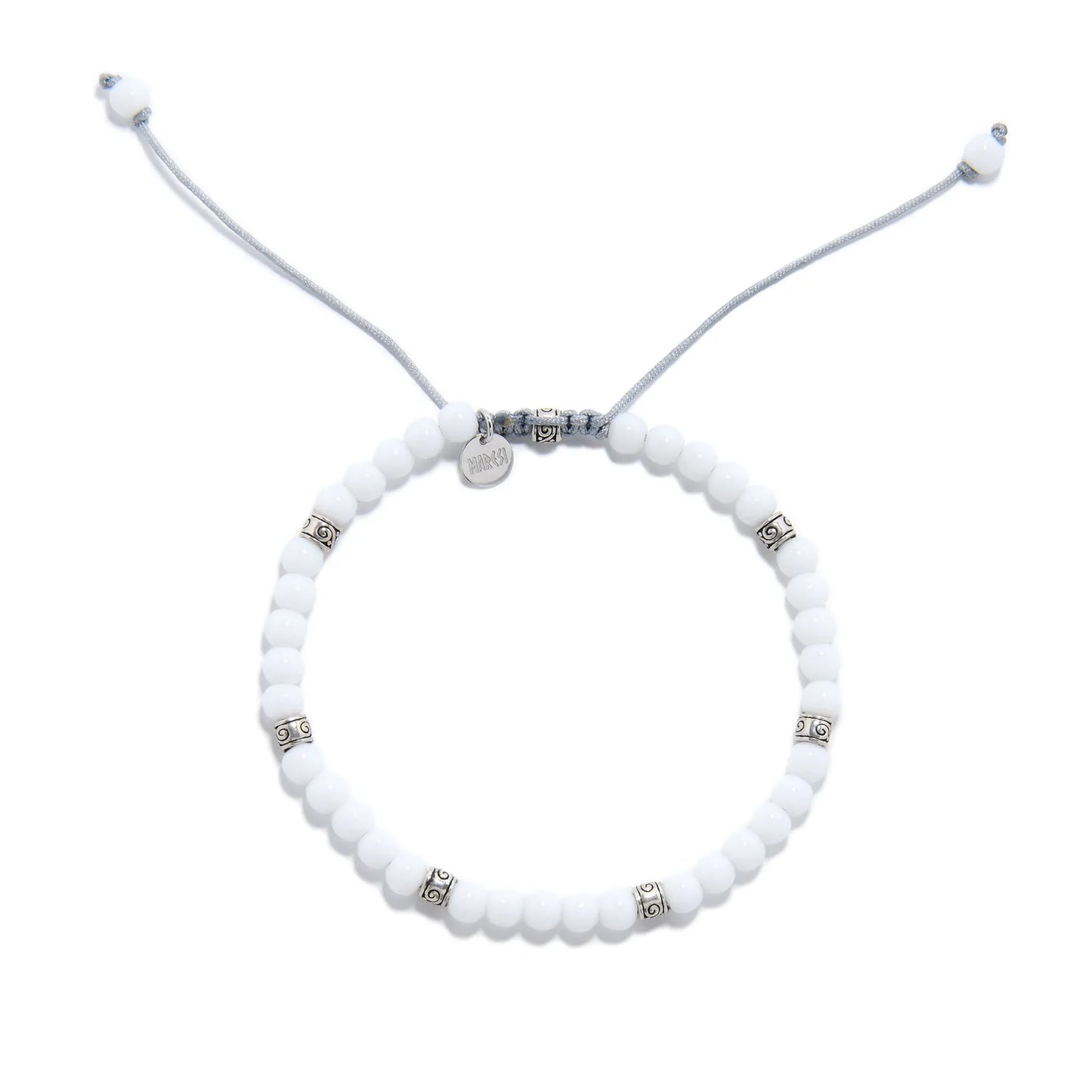 Top view of White Jade Bracelet with round white beads, silver spacers, gray cord, and charm.