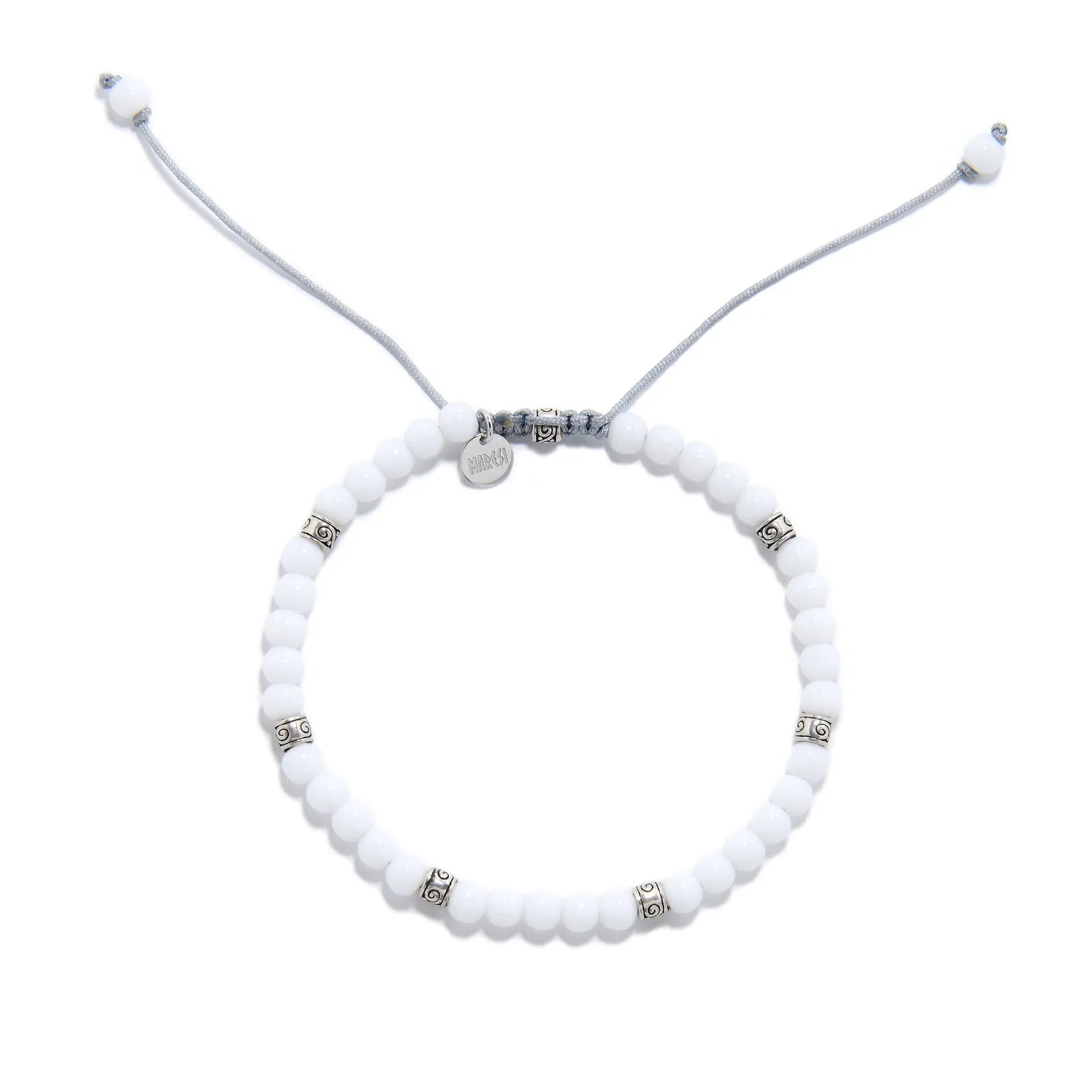 Top view of White Jade Bracelet with round white beads, silver spacers, gray cord, and charm.