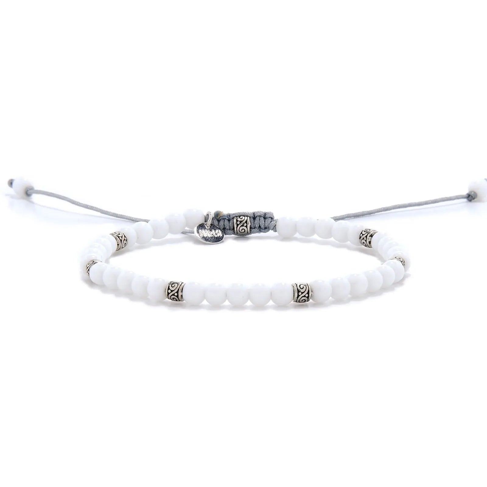 White Jade Bracelet full view with white round beads, silver spacers, and light gray adjustable cord.