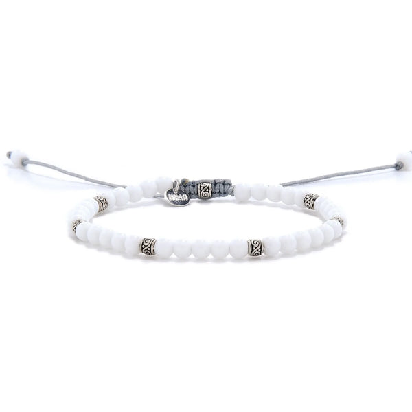 White Jade Bracelet for men full view with white round beads, silver spacers, and light gray adjustable cord.
