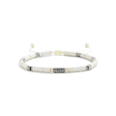 White Stone Jewelry shown in full view with white clay beads with engraved silver spacers and adjustable cord