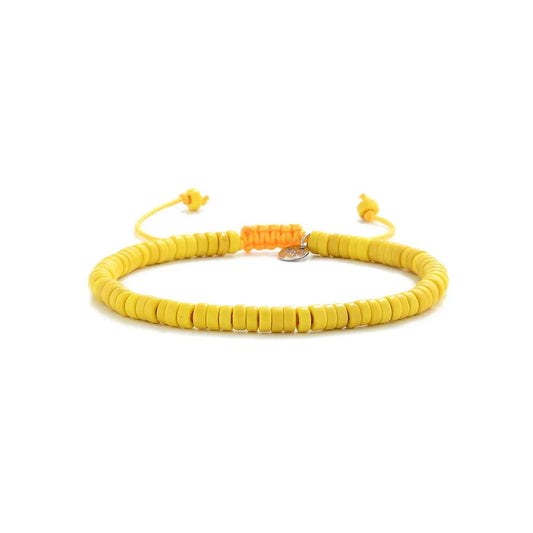 Yellow Bracelet shown in full view with yellow clay beads with silver charm and adjustable cord