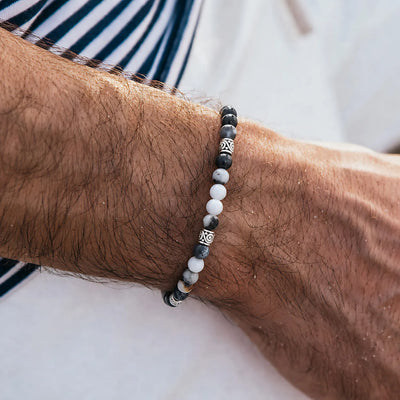 Zebra Jasper Jewelry worn on a wrist with beaded design and adjustable cord